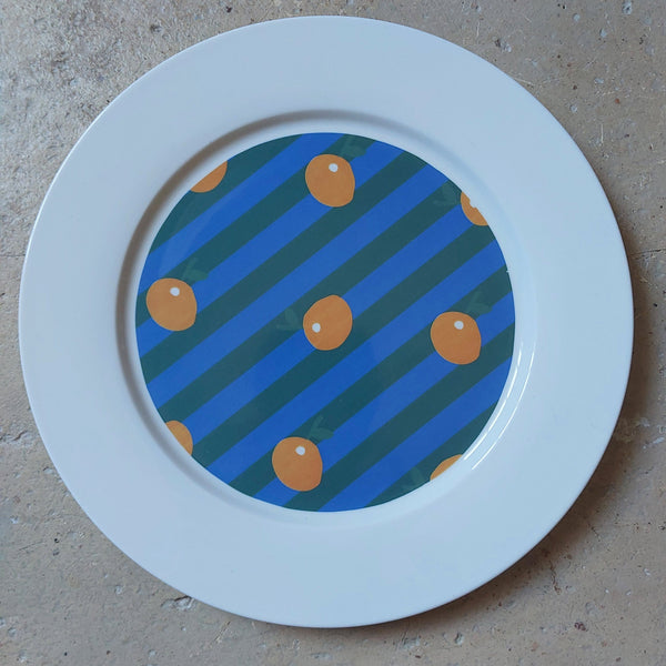 Assiette motif rayures et oranges
